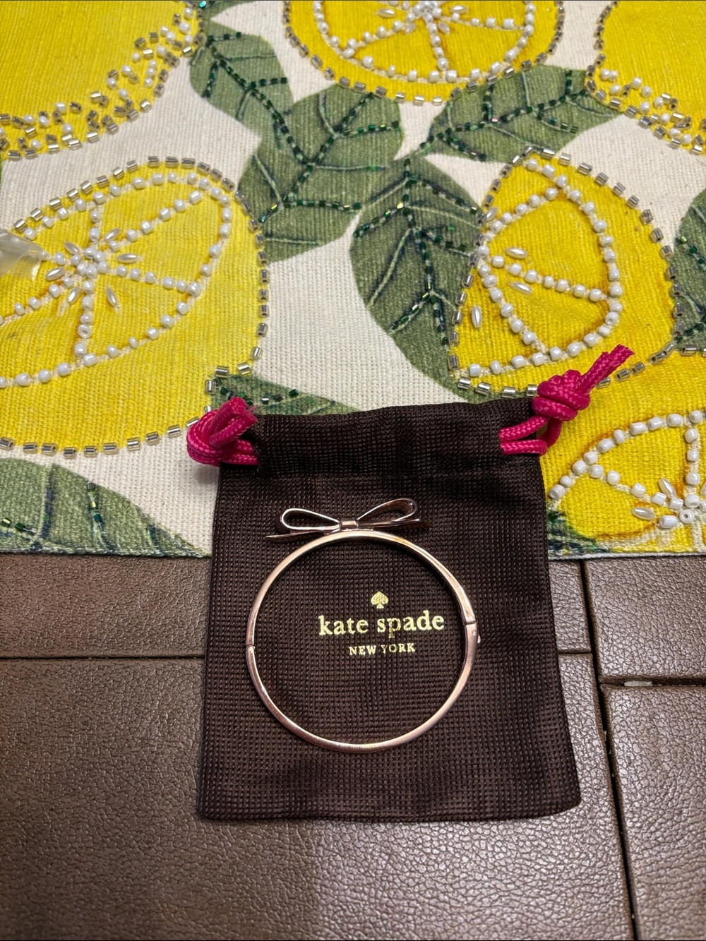 kate spade Rose Gold Bow Bangle with Branded Pouch